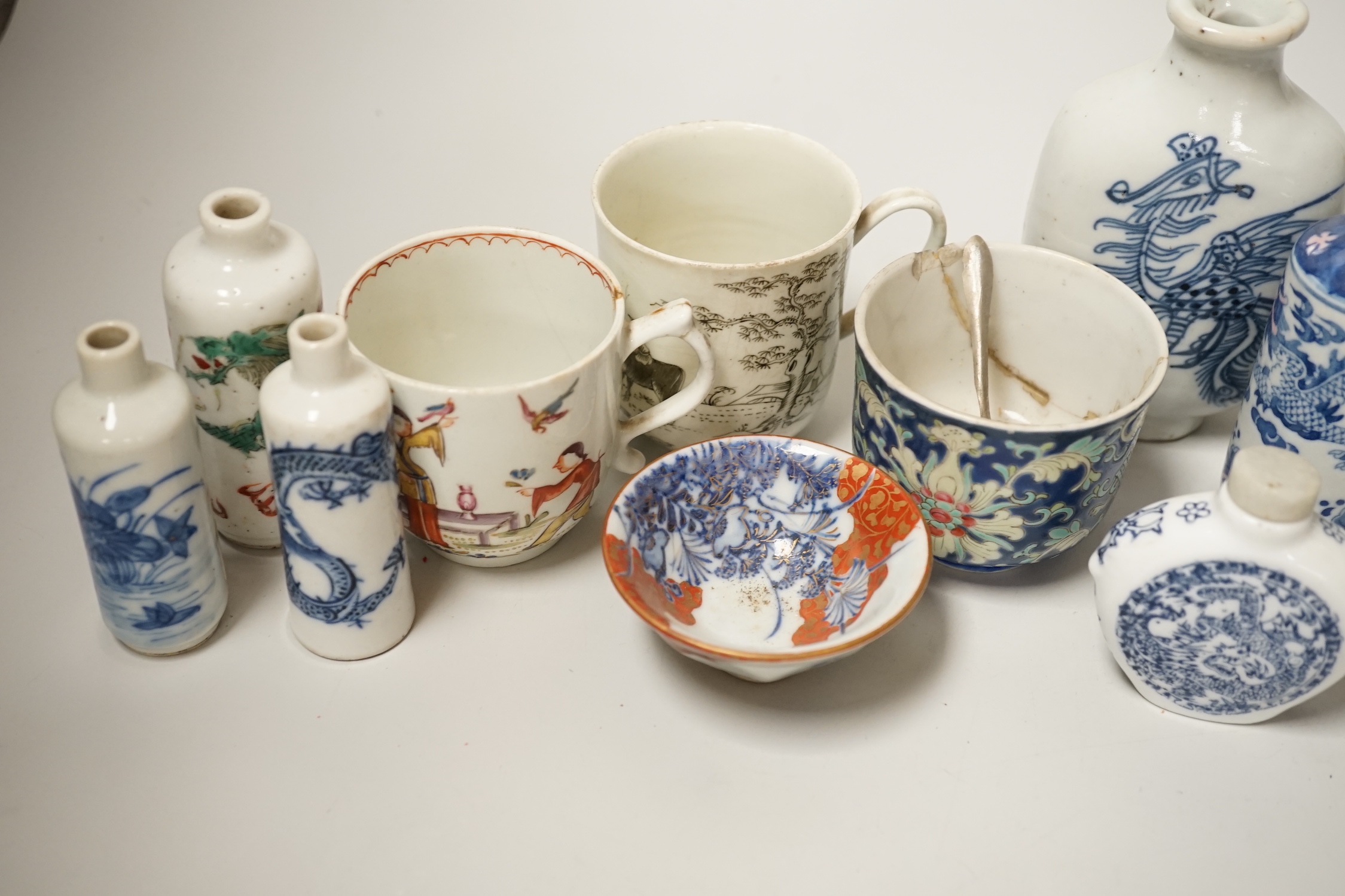 A group of Chinese porcelain snuff bottles and other export Chinese porcelain, an English porcelain cup, etc